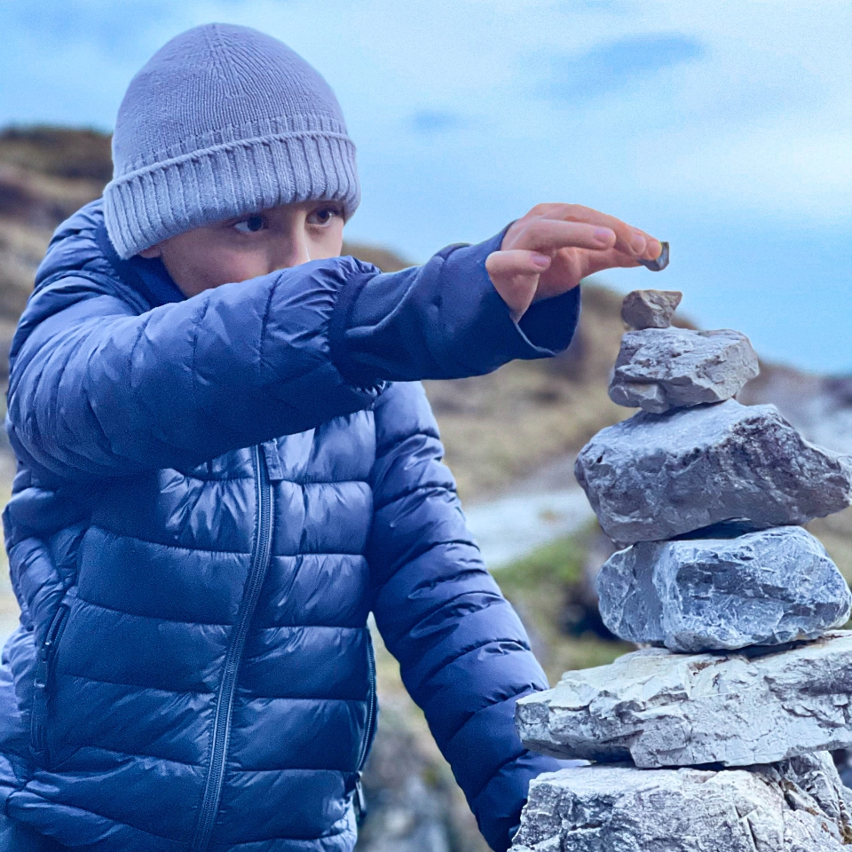 Children playing with stones