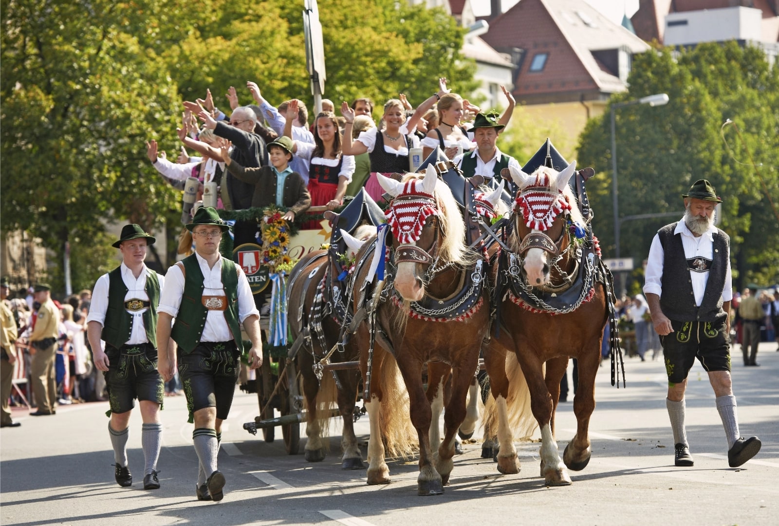 Hosts of the Oktoberfest on a horse coach